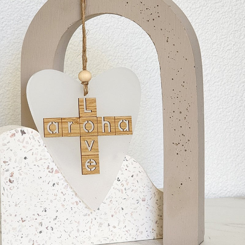 Elegant heart-shaped white satin acrylic ornament, symbolizing love and Aroha, perfect for home decor and heartfelt gifts.