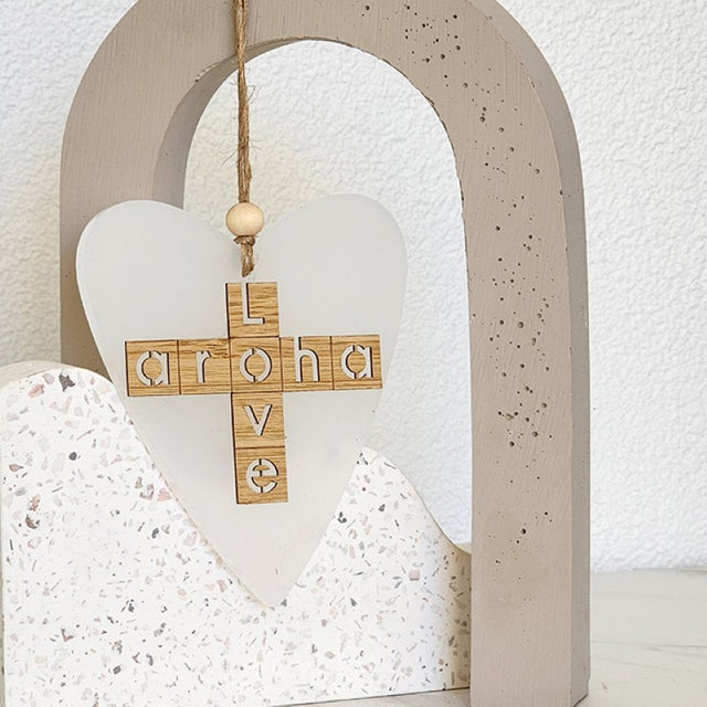 Elegant heart-shaped white satin acrylic ornament, symbolizing love and Aroha, perfect for home decor and heartfelt gifts.