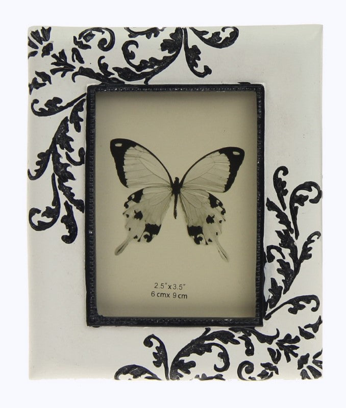 Set of 2 black embossed fern photo frames, ideal for showcasing cherished memories with elegance. 10x1.5x12cm size.