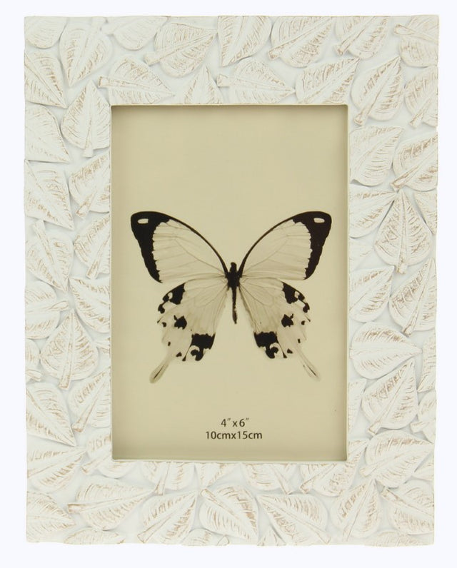 Leaves Collage Photoframe showcasing a unique nature-inspired design, perfect for displaying cherished memories in any space.