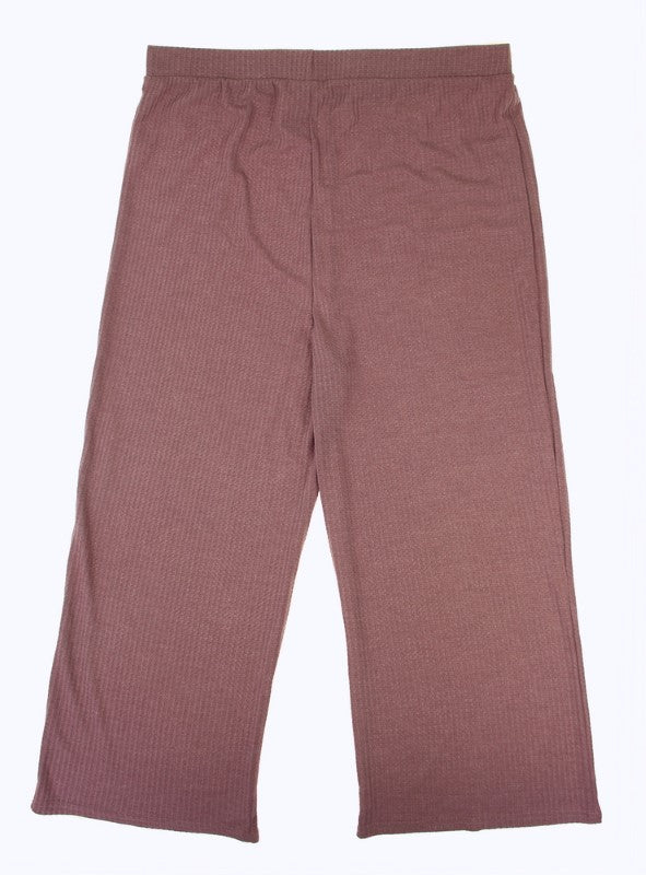 Solid mauve long pants featuring elastic waist, flattering fit, and chic leg opening, ideal for versatile styling.