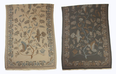 Reversible beige scarf featuring intricate bird and floral designs, perfect for layering and versatile styling.