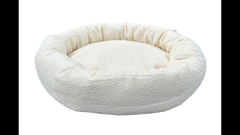 Cream round Boucle dog bed, 90cm, plush and cozy for large pets, easy to clean with removable cover.