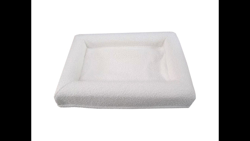 Large cream Boucle orthopedic dog bed (100x65cm) with bolstered walls and washable cover for ultimate comfort and support.