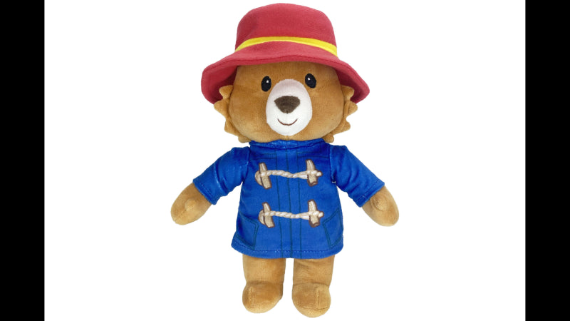 Paddington Bear dog toy, 27.5cm plush with red hat, blue jacket, and squeaker for engaging playtime with your pet.