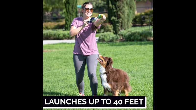 Vibrant green Flying Duck dog toy for interactive fetch, launching up to 40 feet, made for fun in water, grass, or snow.