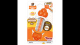 Interactive dog toy with bacon-flavored ends, refillable with treats, promotes chewing, oral health, and endless fun.