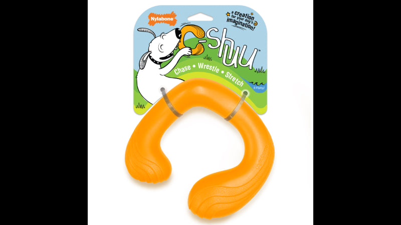 Interactive orange C-Shuu dog toy with a whimsical C-shape, designed for chasing, stretching, and imaginative play.