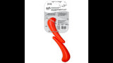 Interactive red dog toy Stik-Go, inspired by sticks, promotes imaginative play and fetch; floats for water fun.