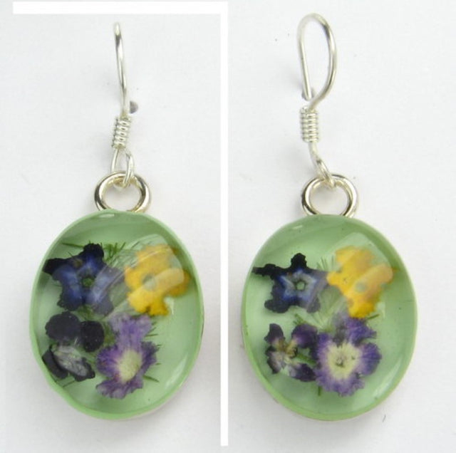 Sterling silver oval earrings featuring vibrant multi-colored flowers and green accents, perfect for any occasion.