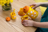 Colorful silicone tea set for kids featuring a teapot, cups, and sugar bowl; perfect for imaginative play and safe fun.