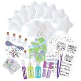 Craft kit for kids to create 5 shooting stars with messages in bottles, colorful paints, and personalized bracelets.