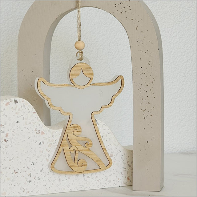 White satin acrylic angel ornament with intricate laser-cut designs, perfect for holiday decor or as a thoughtful gift.
