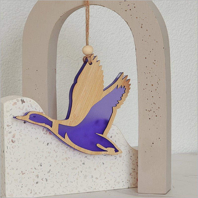Purple satin acrylic duck ornament, laser-cut, ready to hang, perfect for home decor and gifting. Measures 110mm x 90mm.