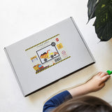 Colorful DIY kit for kids to paint and build a movable dump truck from eco-friendly NZ pine veneer.