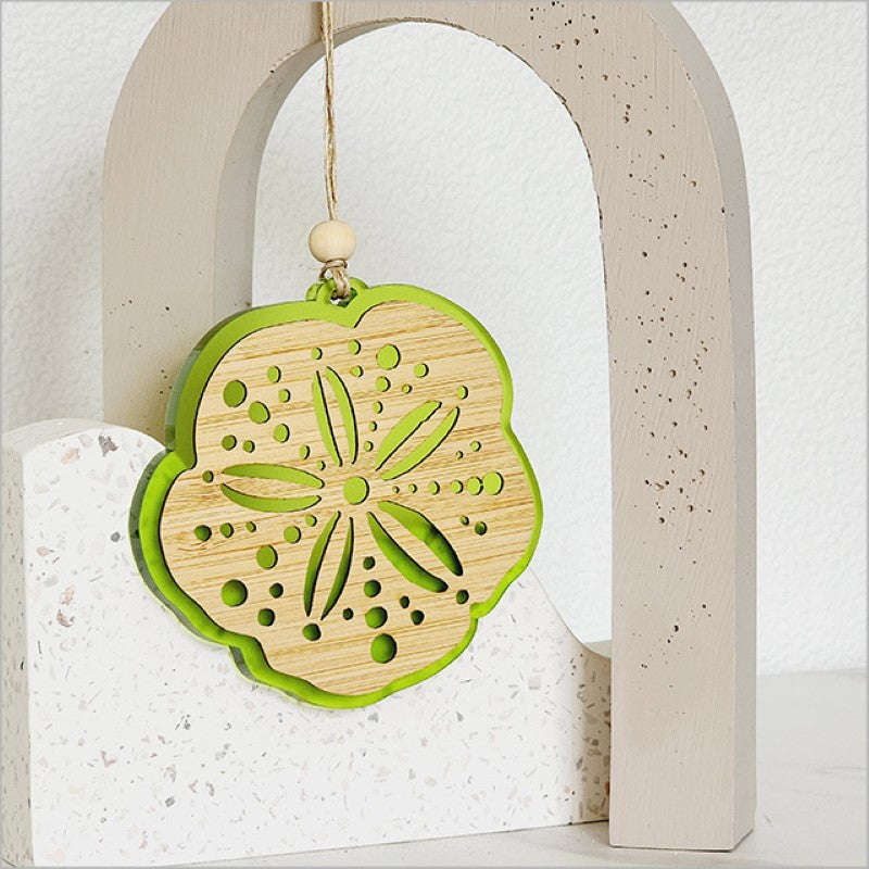 Lime satin acrylic hanging ornament with laser-cut bamboo design, perfect for festive decor or as a charming gift.
