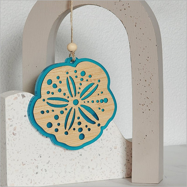 Teal satin acrylic hanging ornament with bamboo design, perfect for home decor or as a thoughtful gift.