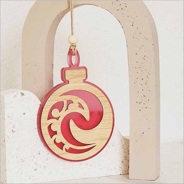 Pink satin acrylic Koru ornament, 80mm x 110mm, perfect for festive decor or gifting, features new beginnings symbol.