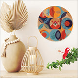 Large printed canvas circle featuring Pacific Fusion design, inspired by Kiwiana, ready to hang with vivid colors.