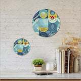 Small printed canvas circle featuring vibrant Kiwiana art, 150mm diameter, ready to hang with pre-drilled keyhole notch.