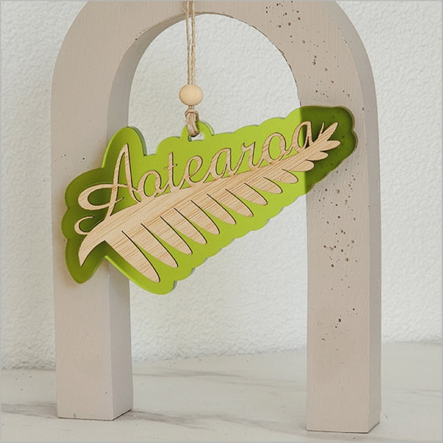 Acrylic Silver Fern ornament in Lime Satin, showcasing New Zealand's heritage with a beautiful laser-cut design.