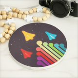 Small printed canvas circle featuring jet planes and Koru symbol, celebrating New Zealand culture and ready to hang.