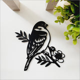 Acrylic wall art featuring a black pihoihoi sparrow, sleek matte finish, ideal for modern decor and easy wall mounting.