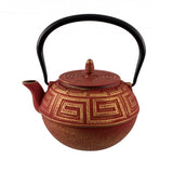 Elegant red and gold Avanti Majestic 1.2L teapot crafted from durable cast iron with a stainless steel infuser for loose teas.