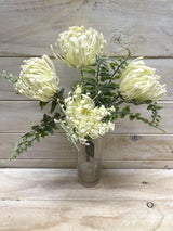 Lifelike white artificial Dusty Warata Bush, a low-maintenance decor piece for elegant indoor spaces.
