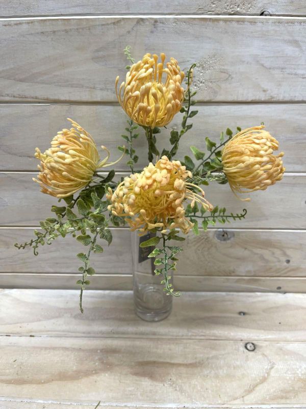 Vibrant yellow artificial Dusty Warata Bush, perfect for brightening any indoor space with a lifelike appearance.