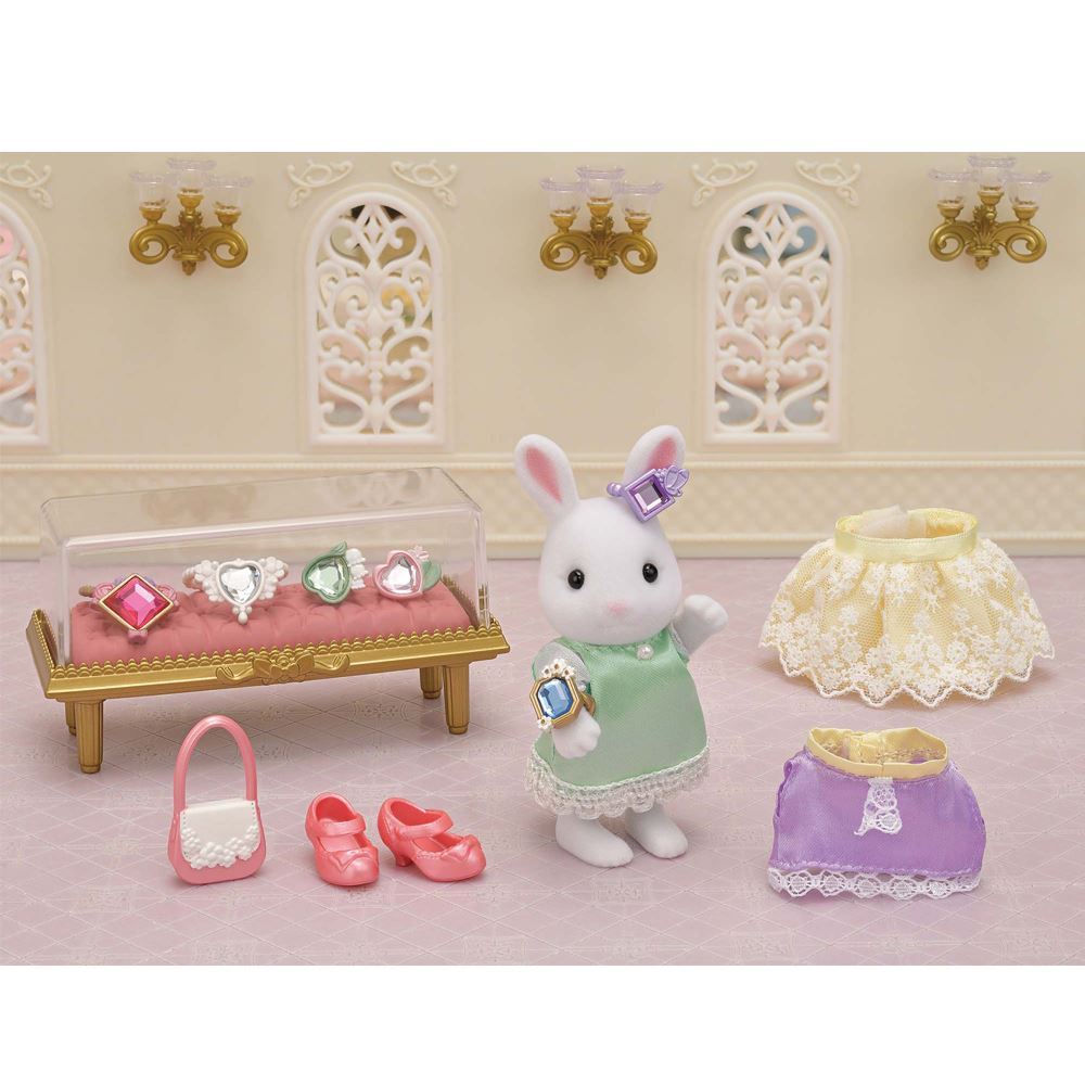 Sylvanian Families Jewels & Gems Play Set featuring poseable Snow Rabbit Older Sister and 13 fashion accessories for creative play.