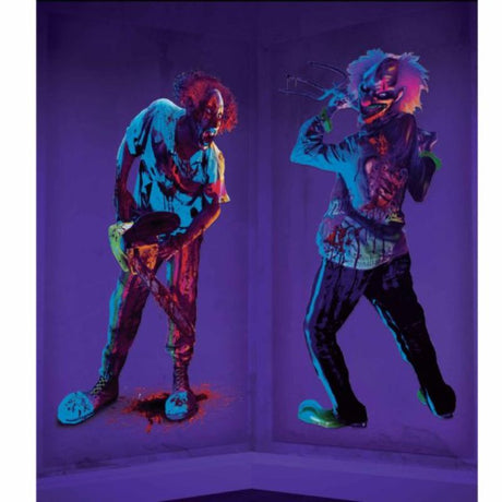 Set of 2 black light reactive creepy carnival scene setters for Halloween, measuring 1.65m x 85cm each.