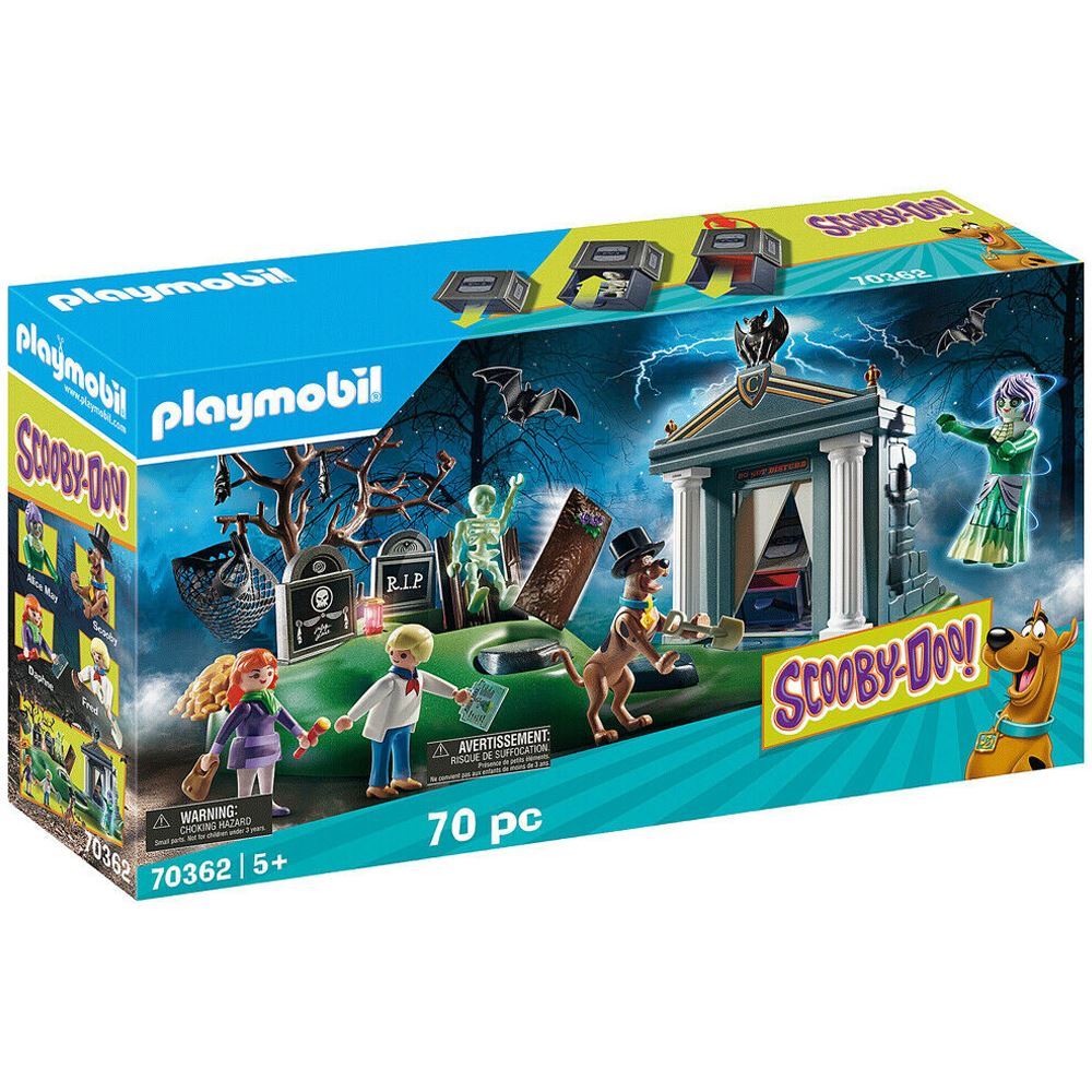 Playmobil Scooby-Doo playset featuring Scooby in a gravedigger costume, Fred, Daphne, and spooky cemetery surprises.