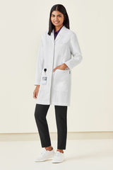 Women's Hope Long Line Lab Coat in white, XS, features a tailored fit, multiple pockets, and stain-resistant fabric.