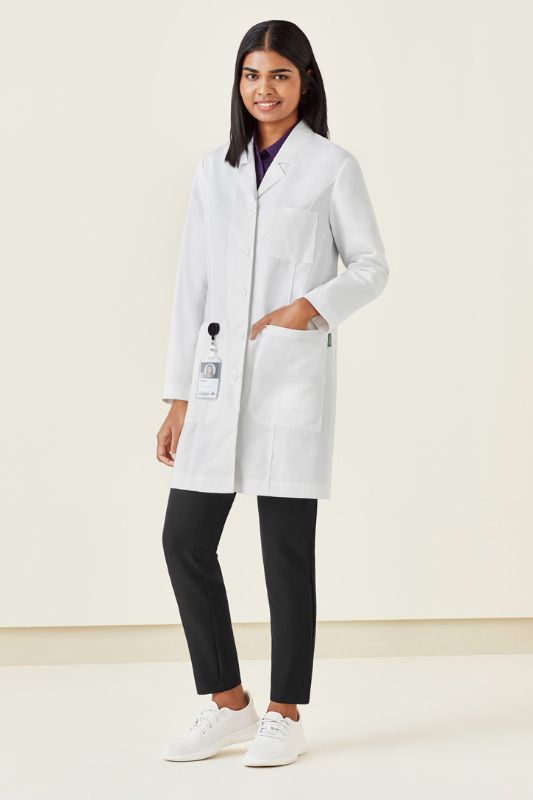 Women's white long line lab coat with a tailored fit, pocket details, and Teflon stain resistance, perfect for professionals.