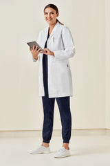 Women's Hope Long Line Lab Coat in White (XS) featuring tailored fit, multiple pockets, and Teflon stain release for durability.