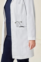 Stylish Women's Hope Long Line Lab Coat in White, featuring a tailored fit, stain-resistant fabric, and multiple pockets.