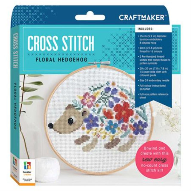 Floral Hedgehog cross stitch kit with bamboo hoop, vibrant threads, and instructional guide for a charming project.