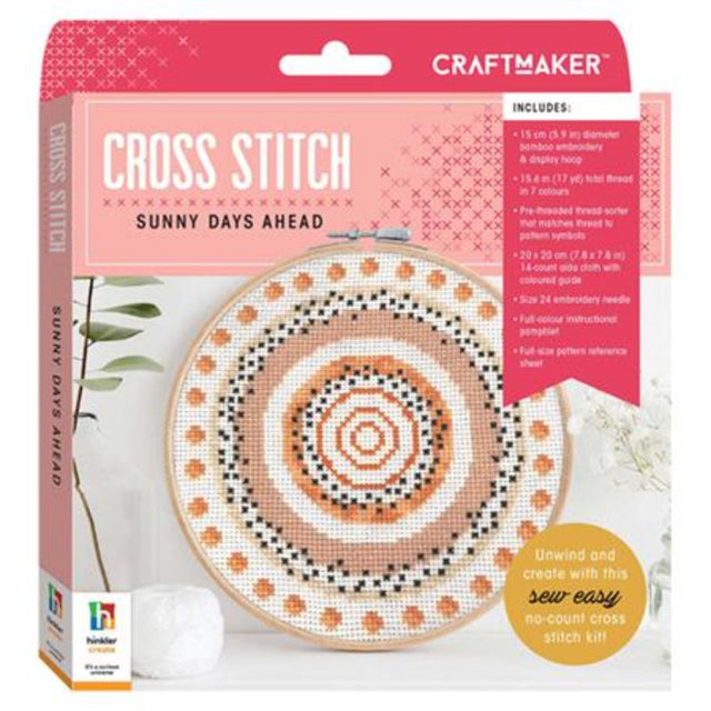 Cross stitch kit featuring a sunny pattern with bamboo hoop, vibrant threads, and easy-to-follow instructions.