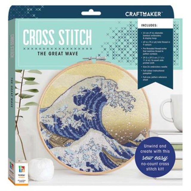 Cross stitch kit featuring The Great Wave Off Kanagawa, with vibrant threads and a bamboo hoop for easy display.