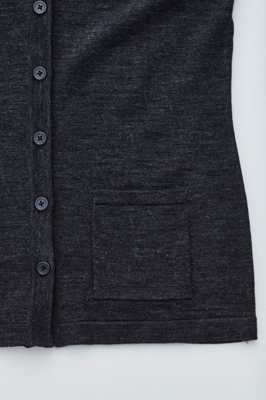 Women's charcoal button front vest in XXS, featuring two pockets, longer hem, and cozy acrylic-merino wool blend.