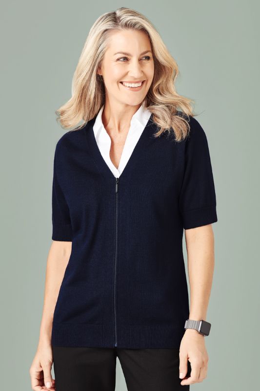 Navy zip-front short sleeve cardigan in XXS, featuring a longer hem for coverage and a blend of acrylic and merino wool.