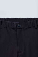 Men's charcoal cargo pants with comfort waistband, multiple storage pockets, and breathable lightweight twill fabric. Size 77.