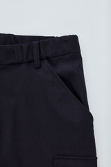 Men's charcoal cargo pants with comfort waistband, multiple pockets, and roll-up legs for versatility and active wear.