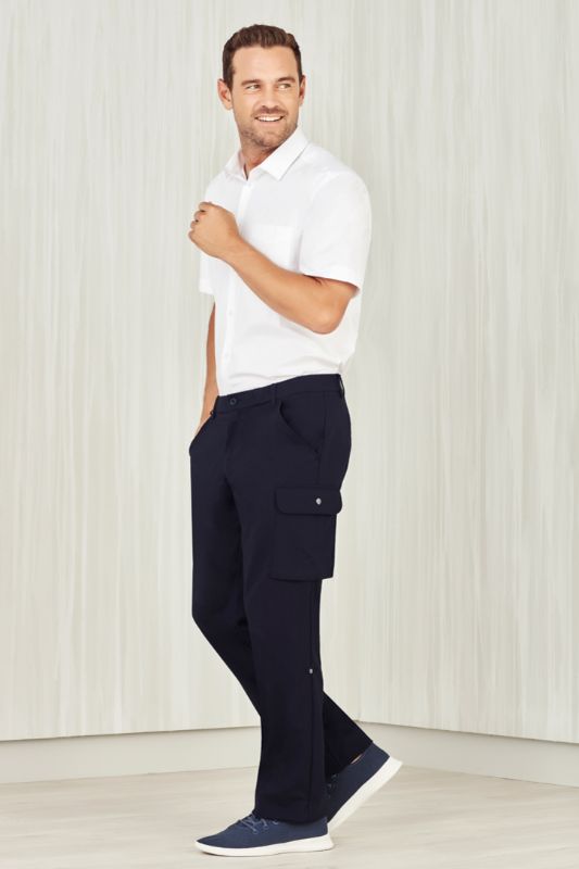 Men's navy cargo pants with comfort waistband, multiple pockets, and roll-up legs for flexibility in various work environments.