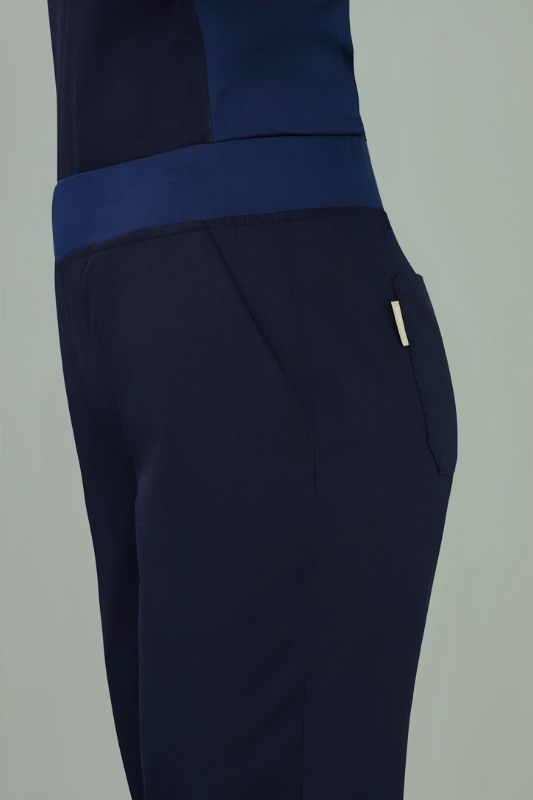 Women's Riley Navy slim leg jogger scrub pant in size 3XL, featuring breathable fabric, adjustable waistband, and stylish cuffs.