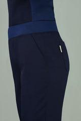 Navy women's jogger scrub pants in size XL, featuring breathable fabric and adjustable knit waistband for comfort.