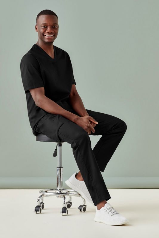 Men's Riley Straight Scrub Pant in Black, featuring a navy knit waistband, practical pockets, and antibacterial treatment for healthcare pros.