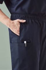 Women's navy scrub pants in size 5XL featuring cargo pockets, elastic waistband, and a modern tapered leg design.