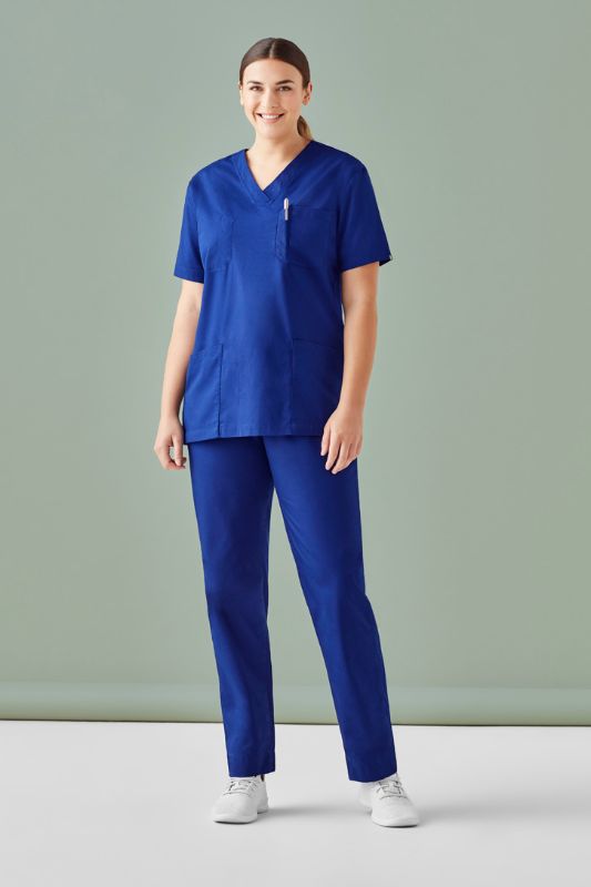 Unisex Hartwell reversible scrub pants in dark blue, featuring chest and back pockets, designed for comfort and versatility.